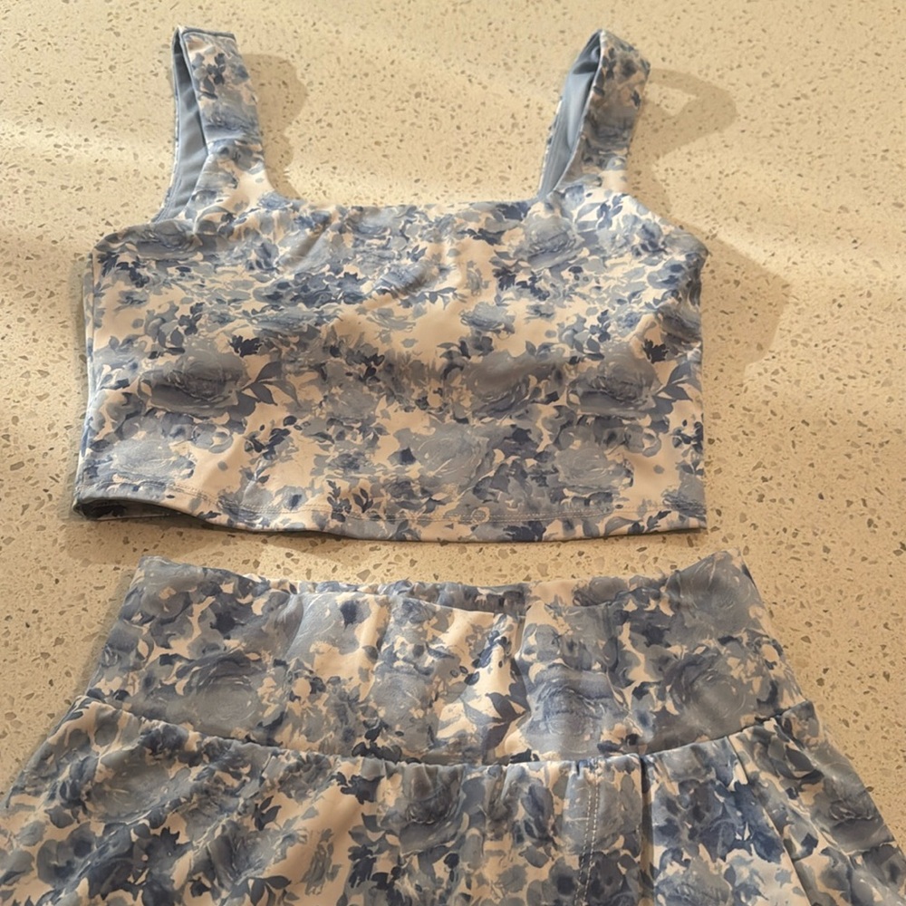 Cropped top with tennis skirt with pocket shorts under skirt